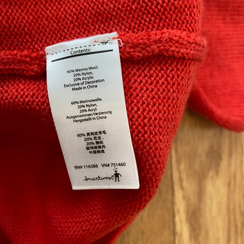 Red Smartwool sweater size small